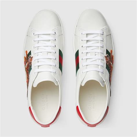 gucci ace tiger sneakers.